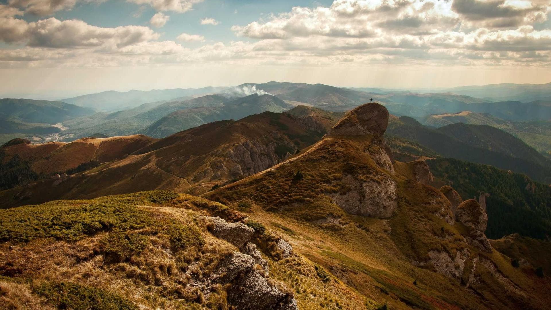 A stunning mountain landscape at sunset.